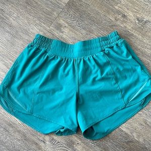 Emerald green Lululemon athletic shorts - size 8 tall